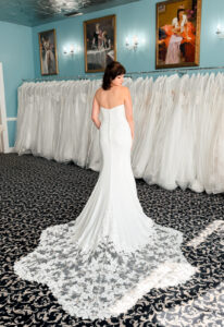 Bliss - Stella's Bridal A wedding gown from Stella's Private Collection featuring exclusive bridal design elements such as intricate lace, elegant draping, luxurious fabrics, and timeless silhouettes. Each gown is uniquely curated and available exclusively at Love it at Stella's Bridal.