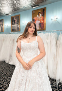 Halo - Stella's Bridal A wedding gown from Stella's Private Collection featuring exclusive bridal design elements such as intricate lace, elegant draping, luxurious fabrics, and timeless silhouettes. Each gown is uniquely curated and available exclusively at Love it at Stella's Bridal.