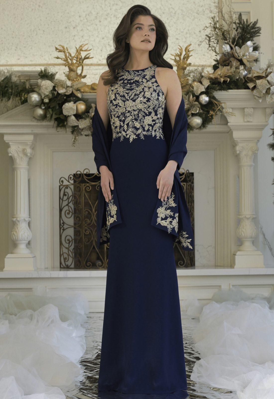 Discover RD33445 by Rina di Montella, a fitted mother of the bride or groom dress featuring gold lace. Shop at Stella’s Bridal in Westminster, MD.