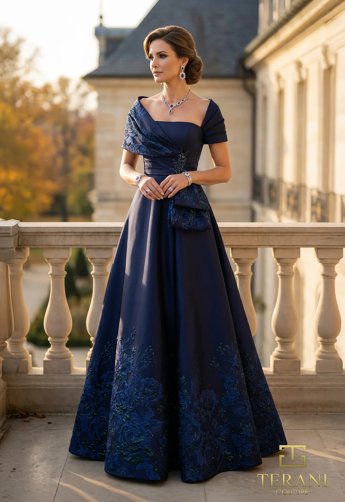 Discover 262M7323 by Terani Couture, an elegant, a-line mother of the bride or groom dress featuring 3D Florals. Shop at Stella’s Bridal in Westminster, MD.