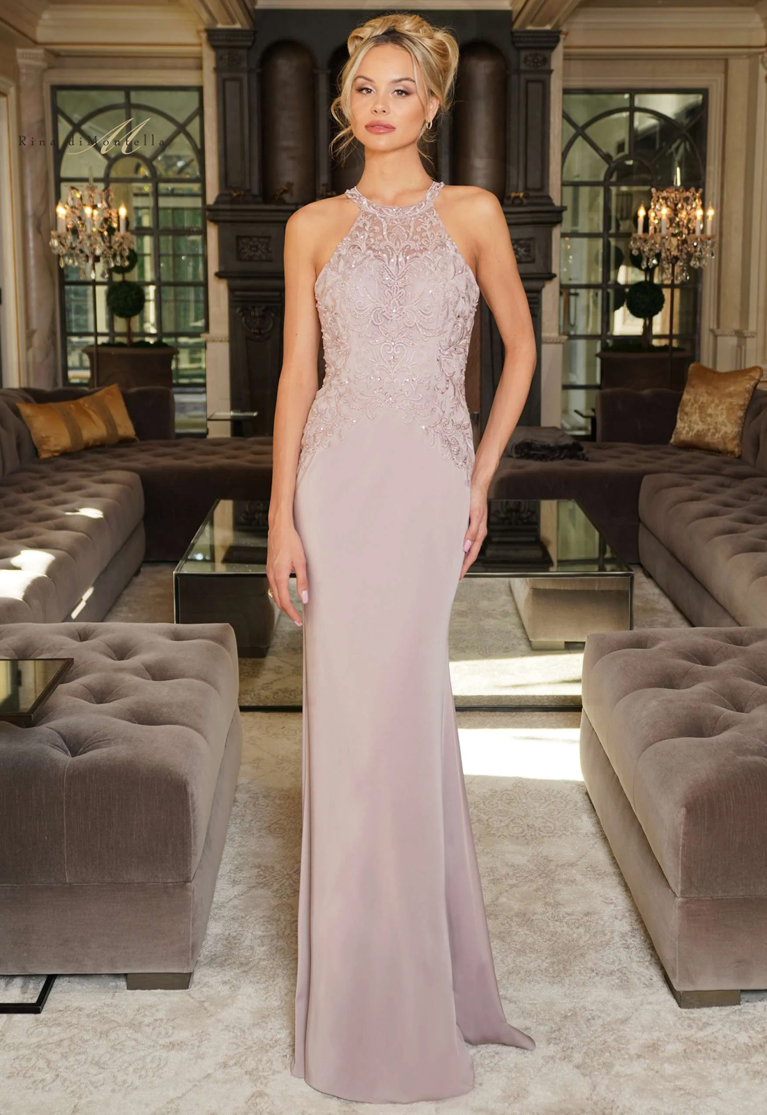 Discover RD2755 by Rina di Montella, a fitted mother of the bride or groom dress featuring a halter neckline. Shop at Stella’s Bridal in Westminster, MD.
